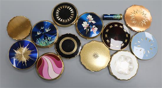 Twelve vintage Stratton powder compacts, including a blue enamelled flying ducks example with matching lipstick holder,